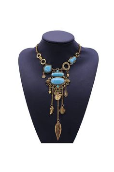 Blue Bohemian Necklaces For Party, Vintage Blue Jeweled Necklaces, Bohemian Blue Necklace With Adjustable Chain, Blue Jeweled Metal Necklaces, Blue Metal Necklaces With Jewels, Vintage Blue Turquoise Metal Necklace, Blue Jeweled Costume Jewelry Necklaces, Blue Costume Jewelry Necklaces With Jewels, Blue Jeweled Costume Necklaces