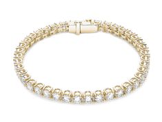 Beautifully handcrafted in 14k gold, our tennis bracelets feature a continuous row of round brilliant cut lab-grown diamonds, graded at VS+ clarity, Very Good cut and G/H color. Each bracelet features a secure push clasp which fits seamlessly with the design. Our stones are made to a consistently high standard and are inscribed with a mark of quality invisible to the naked eye. Visit our quality page for full details on our stone grading. Formal 14k Gold Bracelets With Vvs Clarity, Classic 14k Gold Bracelet With Prong Setting, 14k White Gold Bracelet With Prong Setting, Elegant 14k Gold Tennis Bracelet With Prong Setting, Luxury 14k Gold Round Cut Bracelet, Luxury 14k Gold Round Tennis Bracelet, Timeless 14k Gold Bracelets With Prong Setting, Luxury 14k Gold Tennis Bracelet, Classic Hand Set 14k Gold Bracelets