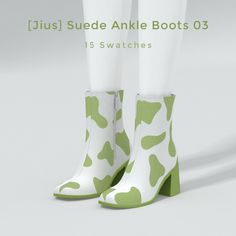 a pair of white and green boots with hearts on them are featured in this image