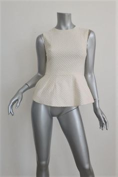 Pierre Balmain Sleeveless Peplum Top Cream Polka Dot Embroidered Cotton Size 38 - Pre-loved. Small brown smudge on center front above bust line. Slight yellowing on underarms. Retails for $775! Sleeveless Peplum Top, Pierre Balmain, Peplum Top, Polka Dot, Polka Dots, Cream, Women's Top