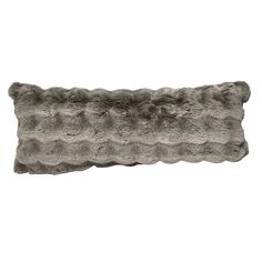 a long gray furry pillow on a white background with no one in the photo or description