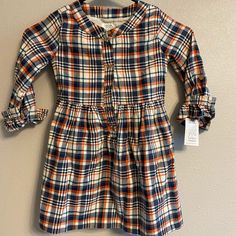 Brand New Plaid Kids Long Sleeve Dress! So Cute! So Cute And You Can Pair With Boots For A Cute Fall/Winter Look! Blue Dress For Playtime In Fall, Casual Orange Dress For Playtime, Casual Orange Dresses For Playtime, Casual Dresses For Playtime In Fall, Blue Fall Playtime Dress, Casual Orange Playtime Dress, Long Sleeve Plaid Dress With Ruffle Hem, Orange Cotton Playtime Dress, Plaid Cotton Dress For Playtime