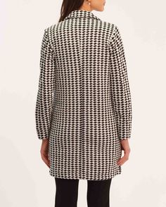 Indulge in luxury and style with our knit houndstooth coat by Philosophy. Features patch pockets and an elegant lapel collar, while the houndstooth print and lined front panel elevate the classic design. Crafted from a superior viscose blend and yarn-dyed knit Jacquard for all-day comfort. Lapel collar Long sleeve One-button front Patch pockets Houndstooth print Lined front panel Viscose blend Machine washable Size + Fit About 35" from shoulder to hem Model measurements: 5'9" tall Model is weari Lapel Collar Coat, Knit Jacquard, Houndstooth Coat, Collar Coat, Collared Coat, Affordable Luxury, Tall Model, Lapel Collar, Black Coat