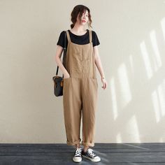 "★★Welcome to Ylistyle Handmade shop Jumpsuit is best choice for a casual day. It is not easy to meet a lovely items. Hope you enjoy it! ★★ DETAILS * More colors available(Fabric #1) https://etsy.me/3orWcZ6 * 100% linen * loose waistband * harem overalls * adjustable strap with button * Plus size Linen pants * wide leg (roomy) * Perfect for Spring, summer, autumn * Dry clean ★★ The model is 170 cm (5′ 7″) tall with a 80 cm (31.5\") bust, 66 cm (26\") waist. She is wearing the army green overalls Summer Everyday Jumpsuits And Rompers With Pockets, Brown Workwear Overalls With Pockets, Casual Beige Cotton Overalls, Casual Cotton Beige Jumpsuits And Rompers, Casual Beige Cotton Jumpsuits And Rompers, Casual Brown Cotton Jumpsuits And Rompers, Casual Baggy Overalls, Casual Baggy Jumpsuits And Rompers For Work, Casual Everyday Jumpsuits And Rompers With Pockets