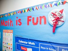 a school bulletin board with a clock on it