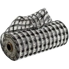 a roll of black and white checkered fabric