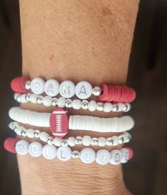 Embrace your inner Bama Fan spirit with this custom handmade clay bead bracelet, designed exclusive, showcasing the crimson and white colors that represent your beloved Roll Tide every gameday!  Bracelets are 7in in length and fit the average wrist. Each order comes with a stack of 5 bracelets as pictured. Each order is made to order and customizable. Alabama Clay Bead Bracelet, Red Stacked Beaded Bracelets For Gifts, Red Stacked Beaded Bracelets As Gift, Adjustable Red Stacked Beaded Bracelets, Adjustable Stacked Red Beaded Bracelets, White Stacked Stretch Bracelet As Gift, White Stacked Stretch Bracelet Gift, Customized White Wristband Bracelet, Adjustable Stacked White Beaded Bracelets