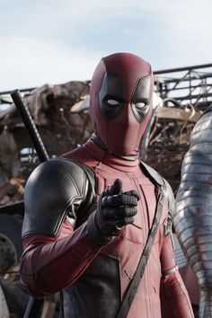 a deadpool character standing next to another deadpool character