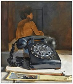 an old fashioned telephone sitting on top of a desk