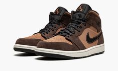 The Air Jordan 1 Mid SE “Earth Tone” is a rugged update to Michael Jordan’s first signature shoe in the popular mid-top style that features earth tones on its design. Living up to its nickname, the “Earth Tone” colorway of the retro basketball shoe is assembled in neutral, earth tones like brown and tan for an autumnal look. Dark Chocolate-colored suede appears on the overlays. The perforated toe, mid-panel, and collar appear in a lighter brown shade of synthetic nubuck. A black Swoosh with brow Earth Tone Shoes, 70s Converse, Nike X Travis Scott, Converse Run, Retro Basketball Shoes, Low Air Jordan 1, Air Jordan 1 Mid Se, Converse Run Star, Jordan 8