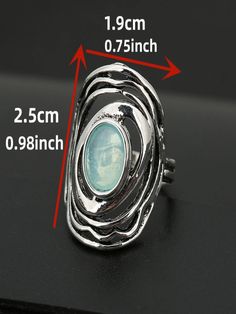 an image of a ring size guide on a black surface with the measurements for it