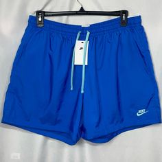 Brand New With Tags! Smoke And Pet Free Home Nike Athletic Shorts Elastic Waistband With Drawstring Lined Blue With A Light Turquoise Embroidered Nike Logo Above Left Hem Pocket On Each Side And Pocket On Backside Standard Fit, Mid Thigh Length 100% Polyester Men’s Size Xl Thanks For Checking Them Out! ***I Ship Every Single Business Day!*** Nike Swim Trunks With Built-in Shorts, Nike Summer Activewear With Elastic Waistband, Nike Activewear With Elastic Waistband For Summer, Casual Blue Swim Trunks With Built-in Shorts, Sporty Light Blue Shorts For Beach, Blue Athleisure Bottoms With Built-in Shorts, Light Blue Moisture-wicking Bottoms For Summer, Blue Bottoms With Elastic Waistband For Swimming, Nike Short Swim Trunks