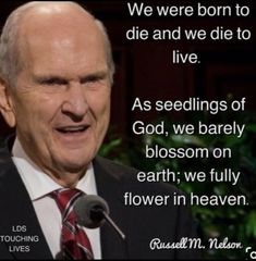 a man in a suit and tie speaking into a microphone with a quote from russell m nelson