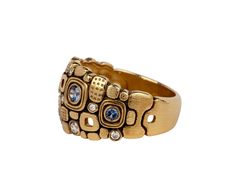 With its geometric, modern design, this Alex Sepkus ring is a stunning take on the traditional cigar band. The front of the ring is a series of connected 18K yellow gold circles, squares and rectangles with a subtly textured surface. Asymmetrically set around the band are round, pale blue sapphires and tiny shimmering white diamonds for the perfect amount of color and sparkle.blue sapphires : vary : 2mm diameter to 3mm diameter each : ~.27cttwwhite diamonds : vary : 1mm diameter to 2.5mm diamete Luxury Classic Domed Sapphire Ring, Alex Sepkus Rings, Alex Sepkus, Mens Diamond Jewelry, Sapphire Band, Dome Ring, Put A Ring On It, Domed Ring, Diamond White