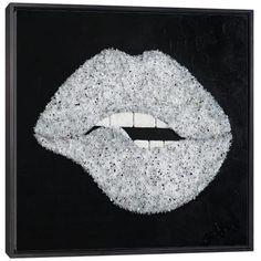 a black and white photo of a woman's mouth with glitter on it canvas print