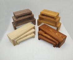 four pieces of wood stacked on top of each other