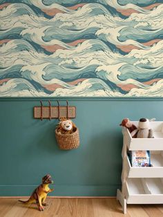 a child's room painted in teal and pink with waves on the wall