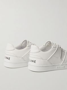 The pared-back look of CELINE HOMME's 'CT-04' sneakers make them the perfect way to ground just about any outfit. Crafted from supple leather, they have a classic low-top silhouette and are set on comfortable rubber soles. Celine Sneakers, Tennis Court Shoes, Celine Shoes, White Leather Sneakers, Sneakers For Men, Sneakers Outfit, Mr Porter, Up Styles, Leather Sneakers