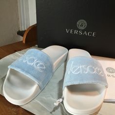 New Versace Slides . Ciabattina Model. New , Never Used. Size 38.5 - 8.5 . 10" Long From Tip To Tip. 3/4" Thickness At Heel. Made In Italy. Light Blue Flat Slides For Spring, Spring Light Blue Flat Slides, Designer Slides For Beach And Spring, Designer Slides For Spring Beach Outing, Designer Summer Slides With Removable Insole, Designer Slides For Spring Vacation, Blue Slip-on Slides For Spring, Designer Slides For Vacation In Spring, Blue Spring Slip-on Slides