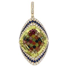 14 Karat Yellow Gold Pendant studded with Fancy Cut 15.46 Ct Lemon Quartz, with unique under stone setting of 2.35 Ct Multi Sapphire, accented with 0.38 Cts Blue Sapphire and 0.62 Cts Diamonds, hand crafted in 14 Karat Yellow Gold. Stone Details: Lemon Quartz: 19.55 x 17 mm Blue Sapphire: 0.80 mm, 0.90 mm, 1.00 mm, 1.10 mm, 1.25 mm, 1.50 mm. Multi Sapphire: 1.25 mm, 1.75 mm, 2.00 mm Stone Weights: Lemon Quartz: 15.46 Cts Blue Sapphire: 0.38 Cts. (Total) Multi Sapphire: 2.35 Cts. (Total) Diamond: Multi Sapphire, Stone Setting, Gold Stone, Lemon Quartz, Yellow Gold Pendants, Sapphire Diamond, Stone Settings, Diamond Studs, Gold Pendant