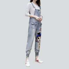 Introducing our streetwear-style Ornamented Women's Denim Jumpsuit from the 2023 Spring-Summer Collection. A sartorial blend of vogue modern and nostalgic vibes. this jumpsuit will make you stand out from the crowd!Distinctive Features: Embroidered Street Style: Get ready to turn heads with this street-trend jumpsuit ââ‚?patterned with eye-catching embroidery for an undeniably cool look. Slim Fit: Crafted to hug your silhouette. this jumpsuit ensures comfort and style so you can look your best. Cats Embroidery, Womens Denim Jumpsuit, Clear Weather, Nostalgic Vibes, Style Jumpsuit, Jumpsuit Online, Jean Overalls, Street Trends, L And Light