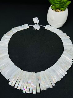 One Piece white Mother of pearl beaded necklace,  Beads Necklace. Handmade/Hand Braided Necklace Necklace length: 20.7 Inches Materials: White Mother of Pearl Adjustable length: No Can be personalized: Yes We take order work as well. Feel free to contact for purchasing goods in bulk. We are Wholesaler & manufacturers of semi-precious & precious gemstones, Loose Gemstones Beads, Cabochons. Measurements & weight are close approximations White Shell-shaped Pearl Drop Necklace, White Necklaces With Colorful Beads For Party, White Pearl Jewelry With Faceted Beads, Handmade White Necklaces With Oval Beads, White Handmade Necklaces With Oval Beads, White Beaded Necklaces With Large Oval Beads, White Beaded Shell Necklace With Round Beads, White Gemstone Beads Round Necklaces, White Gemstone Beads Necklaces