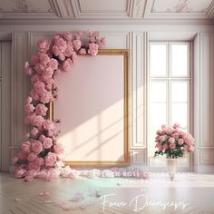 there is a pink flower arrangement on the floor next to a large framed photo frame