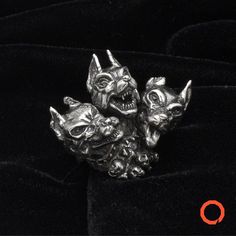 The primary job of Cerberus in Greek mythology was as a watchdog for the underworld. Entirely handcrafted, hand cast, art deco ring. He was a faithful servant to Hades, who was the god of the underworld. The skull on the bottom of the figure gives the idea of how cruel this creature was and why souls were so scared about him. The three heads were sculpted separately based on an angry Doberman dog's reference. Each has a different expression and unique details on ears, eyes and teeth. Amaze and i Greek Mythology Jewelry, Horror Gifts, Big Ring, Greek Jewelry, Big Rings, Handcrafted Rings, Halloween Jewelry, Animal Birthday, Art Deco Ring