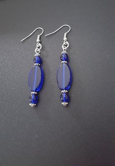 Elegant Blue Oval Beads Jewelry, Elegant Blue Oval Beaded Jewelry, Elegant Oval Beaded Earrings, Elegant Oval Beaded Earrings As Gift, Elegant Oval Beaded Earrings For Gift, Elegant Beaded Earrings With Oval Beads, Blue Oval Beads Jewelry, Elegant Handmade Oval Beaded Earrings, Blue Polished Beaded Earrings For Gifts