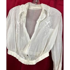 C 1915 blouse with cute style lapel. Missing 2 buttons. Small hole in collar, faint stain below last button near waist.  Bust 34-36 waist 29. Vintage Formal Tops With Covered Buttons, Vintage Formal Top With Covered Buttons, Vintage Collared Blouse For Daywear, Victorian Style Daywear Blouse With Buttons, Victorian Blouse With Buttons For Daywear, Victorian Style Blouse With Buttons For Daywear, Victorian Style Blouse For Daywear With Buttons, Vintage Collared Blouse With Placket, Vintage Fashion Collared Blouse With Buttons