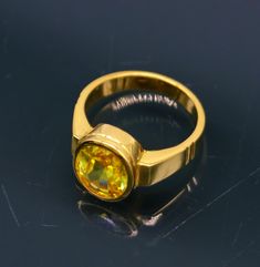 Traditional style handmade 22karat yellow gold gorgeous citrine stone handmade tribal ring band jewelry from Rajasthan India best unisex gifting customized ring. Weight- 77.330 grams approx. Width-11 mm maximum. Metal-yellow gold. Metal purity- 22 karat. Stone-sunela stone(citrine) Marking- 916 stamp. Size-select size. weight of ring may be increase or decrease according to size. note-gold jewelry is handmade designer jewelry . so there can be slight difference in size and weight of the article Yellow Citrine Crystal Ring, Gold Round Yellow Sapphire Ring, Gold Yellow Sapphire Ring, Round, Gold Yellow Sapphire Round Ring, Gold Citrine Ring With Stone Setting, Gold Citrine Rings With Stone Setting, 22k Gold Gemstone Ring, Gold Hallmarked Yellow Sapphire Rings, Gold Citrine Rings With Bezel Setting