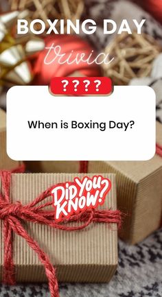 a box that is tied up with red string and the words boxing day on it