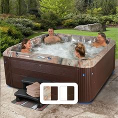 an outdoor hot tub with three people in it