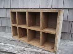 a wooden shelf sitting on top of a wooden bench