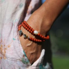 "Fine designed and 100% hand made. Design:  RUYI-Retro South Red Agate Pearl Bracelet (Can be used as necklace or bracelet) Material: Sichuan south red agate which is  full meat persimmon red/ s925 Sterling Silver pendant/ Natural  baroque pearl Bracelet Size: it can be wound 3 layer. please tell me what size for your wrist before you order South Red Agate Bead: 5 mm Natural Baroqu Pearl: 8-9 mm  s925 Sterling silver angle : Around 3mm All accessories are s925 sterling silver  Design concept: I like the south red agate very much. It is not the kind of crystal clear gem, but it gives a hazy and transparent feeling. The overall look is plump, mild and moisturizing. In traditional Chinese culture, wearing ruby is a desire for happiness and good luck, which can bring more blessings to oneself. Red Agate Jewelry With 108 Beads, Handmade Elegant Red Coral Bracelets, Elegant Handmade Red Coral Bracelets, Red Carnelian Bohemian Bracelets, Red Agate Bracelets For Meditation, Bohemian Red Carnelian Bracelets, Red Carnelian Beaded Bracelets For Gift, Handmade Red Agate Bracelets, Red Carnelian Bracelets For Meditation