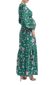 Breeze through your day in this bohemian-style maxi designed with comfortable smocking below the belly to flatter your bump at all stages of pregnancy. 50" length Surplice V-neck Bracelet-length sleeves Lined 100% polyester Machine wash, dry flat Imported Flowy Modest Maternity Maxi Dress, Flowy Maxi Length Maternity Dress, Green Maternity Maxi Dress, Green Bohemian Maxi Dress With Smocked Bodice, Green Bohemian Maxi Dress With Smocked Back, Flowy Maternity Maxi Dress With Smocked Back, Flowy Maternity Maxi Dress, Bohemian Green Maxi Dress With Smocked Back, Bohemian Maternity Dress For Spring Vacation