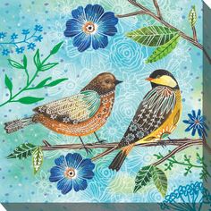 two birds sitting on top of a tree branch next to blue flowers and green leaves