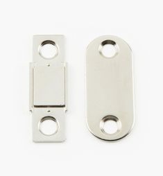 two metal latches on a white background