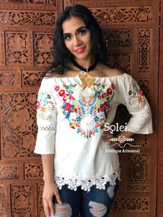 This Beautiful Embroidered blouse is the perfect Top for every day use or a special event. It's made out of cotton and is full of vibrant embroidered florals and beautiful lace and bead details. Note: You have the option to purchase the blouse with the belt for a special price or the blouse on its own. More colors available here: Color: Fuchsia https://www.etsy.com/es/listing/895247217/blusa-floral-con-wipiur-blusa-mexicana?ga_search_query=Esther&ref=shop_items_search_1&pro=1&frs=1 C Festive White Blouse With Embroidered Sleeves, Festive White Top With Embroidered Sleeves, White Bohemian Blouse With Resham Embroidery, White Top With Chikankari Embroidery For Festivals, White Tops With Resham Embroidery For Festivals, White Resham Embroidery Top For Festivals, White Tops For Festivals, White Blouse With Embroidered Short Sleeves, White Folk Blouse With Resham Embroidery