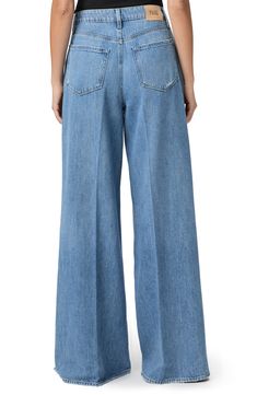 Made from supersoft and drapey denim, these vintage-inspired jeans feature the brand's highest waist and widest, longest legs to create a dramatic silhouette. 34 1/2" inseam; 28 1/2" leg opening; 12" front rise Zip fly with button closure Five-pocket style 60% cotton, 40% lyocell Machine wash, tumble dry Imported Medium Wash Wide Leg Flare Jeans With Belt Loops, Denim Blue Wide Leg Pants With Five Pockets, Classic Wide Leg Flare Jeans With Five Pockets, Chic Wide Leg Flare Jeans With Five Pockets, Wide Leg Flare Jeans With Five Pockets, Classic Denim Wide Leg Pants For Fall, Spring Wide Leg Flare Jeans With Belt Loops, Spring Wide Leg Rigid Denim Flare Jeans, Classic Denim Wide Leg Pants For Spring