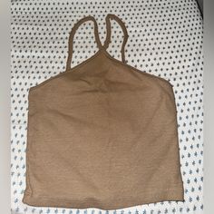 Light Brown Crop Top From Zara Never Worn!! Only Tried On! Features A High Neck Line. So Cute With White Jeans! Size Small But Fits Xs As Well Zara Casual Fitted Halter Top, Zara Fitted Casual Halter Top, Casual Brown Halter Neck Tank Top, Casual Fitted Zara Halter Top, Zara Casual Halter Neck Top, Zara Casual Cami Crop Top, Light Brown Crop Top, Brown Crop Top, Zara Crop Top