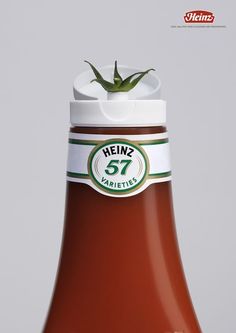 a bottle of ketchup with a plant growing out of it's top