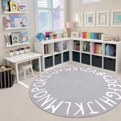 a child's playroom with bookshelves and toys