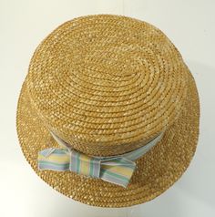 -Description- >boy's straw hat with striped bow ribbon >ribbon is blue, pink, green, yellow >cute hat! >condition: great >color(s): tan, blue, green, pink, yellow >fabric(s): straw >size: one size fits most -social media- instagram: @voguevibesvintage H#1 VVV0380 Adjustable Flat Brim Hat For Picnic, Casual Top Hat With Short Brim For The Beach, Casual Top Hat With Flat Brim For Beach, Adjustable Short Brim Hats For Picnic, Retro Wide Brim Fedora For Beach, Adjustable Bucket Hat For Picnic, Casual Adjustable Top Hat For Beach, Retro Spring Boater Hat With Wide Brim, Retro Short Brim Bucket Hat For Beach