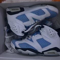 Jordan 6 Unc Blue Low-top Sneakers With Contrasting Heel, Blue Low-top Sneakers With Contrasting Heel Counter, Blue High-top Sneakers With Contrasting Heel, Sporty Jordan Shoes With Branded Heel Counter, Blue Sneakers With Contrasting Heel And Round Toe, Jordan 4 Women, Red And White Jordans, Jordan Retro 1 Low, Jordan 12 Black