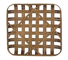 a square rattan basket on a white background