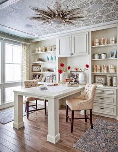 a white table and chairs in a room