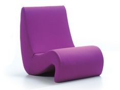 a purple chair sitting on top of a white floor