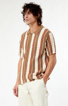 PacSun's Tan Button Down Knit Polo Shirt brings texture to your 'fit. Complete with a collared neckline, short sleeves, a regular fit, button closures, and a striped knit fabrication, this shirt refines your night-out attire.


	Collared neckline
	Short sleeves
	Regular fit
	Button closures
	Knit fabrication
	Striped
	100% Cotton
	Machine washable Knit Shirts, Polo Knit, Knit Polo Shirt, Pacsun Mens, Stripes Texture, Mens Stripes, Knit Polo, Knit Shirt, Short Sleeve Polo