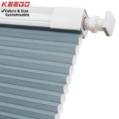 an image of a roller shade with the words keso on it and white trim